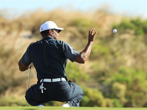 NASSAU, BAHAMAS - DECEMBER 02:  Tiger Woods of the United States prepares to play a shot during the third round of the Hero World Challenge at Albany, Bahamas on December 2, 2017 in Nassau, Bahamas.