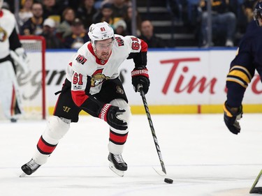 Mark Stone #61 of the Ottawa Senators skates up ice with the puck during the first period against the Buffalo Sabres at the KeyBank Center on December 12, 2017 in Buffalo, New York.