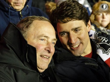 OTTAWA, ON - DECEMBER 16: (L-R) Gary Bettman commissioner of the NHL chats with Justin Trudeau, Prime Minister of Canada, during the 2017 Scotiabank NHL100 Classic between the Ottawa Senators and the Montreal Canadiens at Lansdowne Park on December 16, 2017 in Ottawa, Canada.