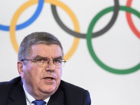International Olympic Committee (IOC) President Thomas Bach attends a press conference following an executive meeting on Russian doping, on December 5, 2017 in Lausanne. Russia were banned from the 2018 Olympics on December 5 over state-sponsored doping but the International Olympic Committee said Russian competitors would be able to compete "under strict conditions".