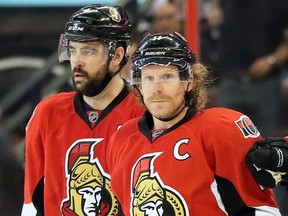 Former players Chris Phillips (left) and Danile Alfredsson will draft the Sens' alumni teams for the game at Parliament Hill in February. (WAYNE CUDDINGTON/POSTMEDIA FILE)