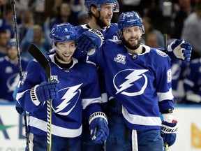 Tampa Bay Lightning center Tyler Johnson, left, celebrates his goal against the Ottawa Senators on Dec. 21, 2017