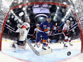 Anders Lee of the New York Islanders scores a powerplay goal on Craig Anderson of the Ottawa Senators at the Barclays Center on Dec. 1, 2017