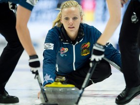 Skip Alli Flaxey watches as lead Morgan Court and second Lynn Kreviazuk sweep her shot during the Olympic curling trials action on Dec. 5, 2017