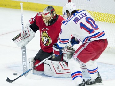 New York Rangers left-wing J.T. Miller tries to tip the puck past Ottawa Senators goalie Craig Anderson.