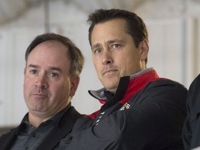 Ottawa Senators general manager Pierre Dorion and head coach Guy Boucher
