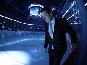 Senators head coach Guy Boucher walks towards his bench last Sunday's game against the Jets. The Senators lost that one 5-0 after a "normal" morning skate, so Boucher cranked up the tempo on Saturday at San Jose.