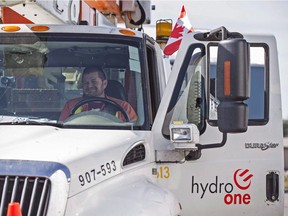 Hydro One workers are shown in this file photo.