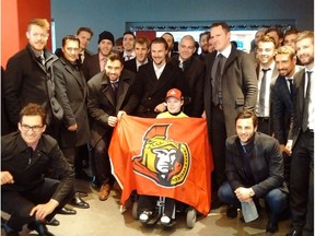 The Ottawa Senators visit with Jonathan Pitre during a trip to Minneapolis on Wednesday, March 29, 2017.