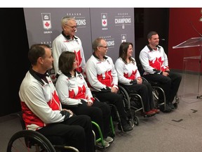 The Canadian Paralympic team for the 2018 Winter Games in South Korea includes athletes, left to right, Jamie Anseeuw, Marie Wright, Dennis Thiessen, Ina Forrest and Mark Ideson, with coach Wayne Kiel standing behind them. Ken Warren/Postmedia.