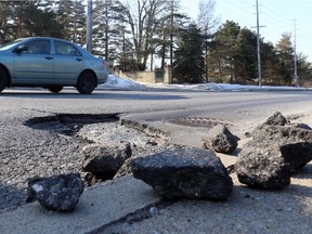 Pothole on Baseline east bound between Greenback and Woodroffe in Ottawa, February 28, 2017.   Photo by Jean Levac  ORG XMIT: 126068