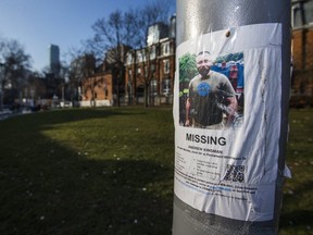 Missing person poster for Andrew Kinsman at Barbara Hall Park near Church St. and Wellesley St. E in Toronto, Ont. on Sunday December 3, 2017.