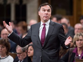 Minister of Finance Bill Morneau responds to a question during Question Period in the House of Commons Thursday Nov. 30, 2017 in Ottawa. THE CANADIAN PRESS/Adrian Wyld