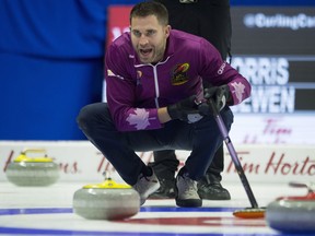 Skip John Morris watches a shot approach the house during the Canadian Olympic curling trials in Ottawa on Dec. 3, 2017