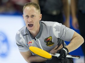 Skip Brad Jacobs, of Sault Ste. Marie, Ont., reacts to a shot entering the house during the Canadian Olympic curling trials against team Koe, in Ottawa on Sunday, December 3, 2017.