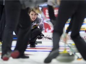 Casey Scheidegger of Lethbridge, Alta.,  watches a shot approach the house during Olympic curling trials action on Tuesday in Ottawa.