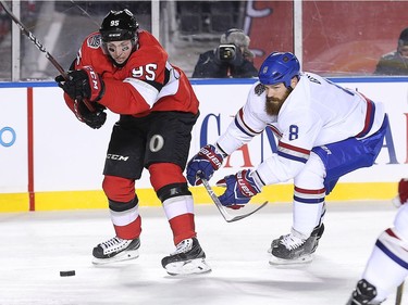 Matt Duchene takes a shot while Jordie Benn defends in the first period as the Ottawa Senators take on the Montreal Canadiens in the 2017 Scotiabank NHL 100 Classic outdoor hockey game at TD Place in Ottawa.  Photo by Wayne Cuddington/ Postmedia