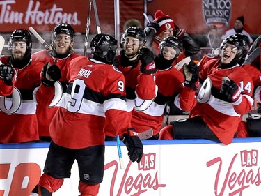 Bobby Ryan is congratulated on his goal by the bench in the third period as the Ottawa Senators take on the Montreal Canadiens in the 2017 Scotiabank NHL 100 Classic outdoor hockey game at TD Place in Ottawa.  Photo by Wayne Cuddington/ Postmedia