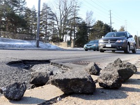 A pothole is seen on Baseline Road in February 2017. An analysis of Ottawa roads gave an overall grade of fair.