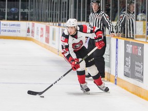 Sasha Chmeleveski of the Ottawa 67's carries the puck up the ice during the second period of an Ontario Hockey League game against the Niagara IceDogs at Ottawa on Dec. 9, 2017