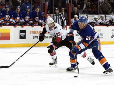 Islanders forward Jason Chimera prepares to shoot to score and score against Senators netminder Craig Anderson in Friday's game.
