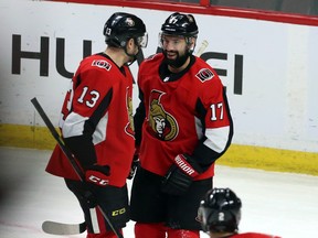 Ottawa Senators' Nick Paul (13) celebrates his goal with teammate Nate Thompson (17) during second period NHL hockey against the Columbus Blue Jackets, in Ottawa, Friday, December 29, 2017. THE CANADIAN PRESS/Fred Chartrand
