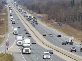 Traffic moves along Highway 401 at the Dorchester Road interchange in London, Ont. on Wednesday November 18, 2015. Craig Glover/The London Free Press/Postmedia Network  addL highway 401