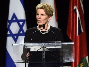 Ontario Premier Kathleen Wynne speaks during the memorial service for Apotex billionaire couple Barry and Honey Sherman in Mississauga on December 21, 2017. (THE CANADIAN PRESS/Nathan Denette)