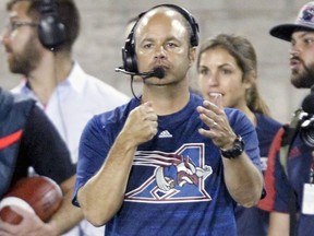 Noel Thorpe signals a formation during a game in 2016, when he was Montreal Alouettes defensive co-ordinator. He will hold that role and also coach defensive backs with the Redblacks in 2018. John Mahoney/Postmedia