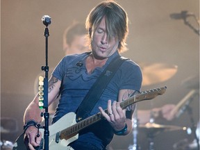Keith Urban on the Bell Stage as day 8 of the RBC Ottawa Bluesfest gets underway at the Canadian War Museum.
