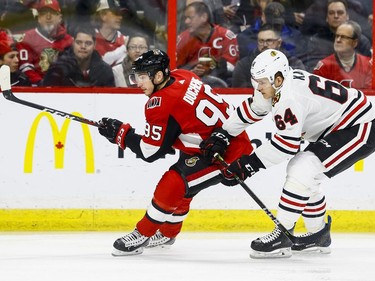 Ottawa Senators Matt Duchene eludes the check of Chicago Blackhawks David Kampf during NHL action at the Canadian Tire Centre in Ottawa on January 9,2018. Errol McGihon/Postmedia