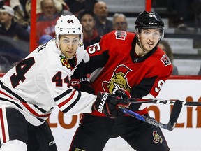 Senators centre Matt Duchene, right, battles with the Blackhawks' Jan Rutta during a Jan. 9 game at Canadian Tire Centre. Errol McGihon/Postmedia