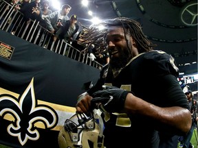 Cameron Jordan #94 of the New Orleans Saints runs off the field after his team defeated the Carolina Panthers during the NFC Wild Card playoff game at the Mercedes-Benz Superdome on January 7, 2018 in New Orleans, Louisiana.