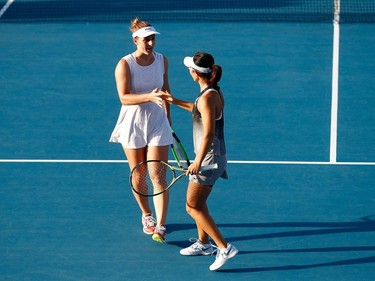 Gabriela Dabrowski of Ottawa and Yifan Xu of China during Friday's match against Latisha Chan of Taiwan and Andrea Sestini Hlavackova of the Czech Republic in Sydney.