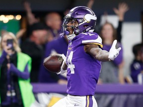 Stefon Diggs of the Minnesota Vikings celebrates after scoring a touchdown to defeat the New Orleans Saints in the NFC Divisional Playoff game at U.S. Bank Stadium on January 14, 2018 in Minneapolis, Minnesota.  (Photo by Jamie Squire/Getty Images)