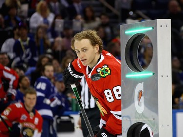 Patrick Kane of the Chicago Blackhawks competes in the puck-control relay.