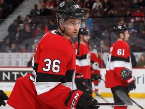 Colin White (36) flips a puck during the pre-game warmup with the Senators on Saturday night.  Andre Ringuette/NHLI via Getty Images