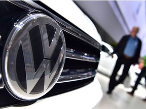 In this file photo taken on June 22, 2016 a Volkswagen logo is seen on a VW Tiguan on display during German carmaker Volkswagen shareholders' annual general meeting.