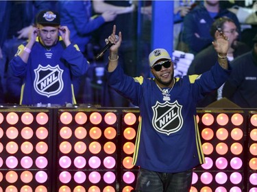 Singer Flo Rida performs before the skills competition in Tampa on Saturday night.