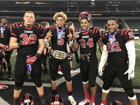 Joining in the celebration of Canada's victory in the U18 game at Arlington on Wednesday were, left to right, Tyson Rowe (33) of Calgary, Jalen Philpot (5) of Surrey, B.C.; Adre Simmonds of Westphal, N.S.; and Johnathan Rosery (21) of Edmonton. Football Canada photo