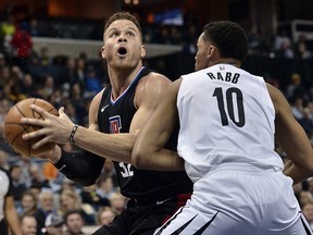 Los Angeles Clippers forward Blake Griffin, left, looks to the basket as Memphis Grizzlies forward Ivan Rabb (10) defends Friday, Jan. 26, 2018, in Memphis, Tenn. (AP Photo/Brandon Dill)