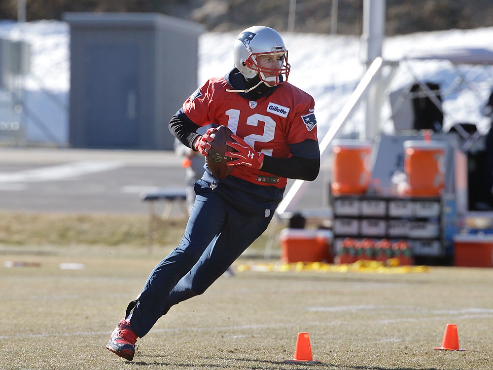 Tom Brady takes batting practice with Rob Gronkowski