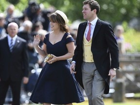 FILE - In this Saturday, May 20, 2017 file photo, Britain's Princess Eugenie and her partner Jack Brooksbank arrive for the wedding of Pippa Middleton and James Matthews at St Mark's Church in Englefield, England. Buckingham Palace said Monday Jan. 22, 2018, Princess Eugenie, the daughter of Prince Andrew and his ex-wife Sarah Ferguson, will marry Jack Brooksbank in Autumn 2018. (Justin Tallis/Pool Photo via AP, File) ORG XMIT: LON110