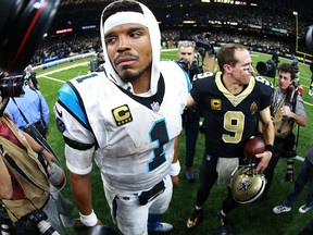 Cam Newton of the Carolina Panthers walks off the field after his team was defeated by the New Orleans Saints during the NFC Wild Card playoff game at the Mercedes-Benz Superdome on Jan. 7, 2018
