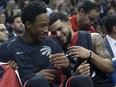 Toronto Raptors DeMar Derozan and Fred VanVleet near the end of a game against the Cleveland Cavaliers on Jan. 11, 2018