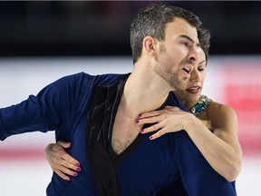 Eric Radford, front, and Meagan Duhamel perform their free program during the senior pairs competition of the Canadian figure skating championships in Vancouver on Saturday.