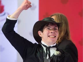 Keegan Messing, of Sherwood Park, Alta., celebrates after performing his free program during the senior men's competition at the Canadian Figure Skating Championships in Vancouver, B.C., on Saturday January 13, 2018.