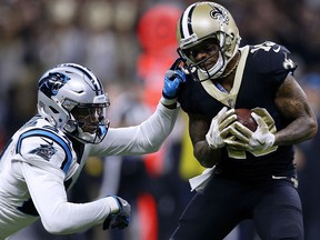 Ted Ginn of the New Orleans Saints catches the ball for a touchdown as James Bradberry of the Carolina Panthers defends at the Mercedes-Benz Superdome on January 7, 2018 in New Orleans. (Jonathan Bachman/Getty Images)