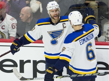 St. Louis Blues defenceman Alex Pietrangelo (27) celebrates his goal with defenceman Joel Edmundson.