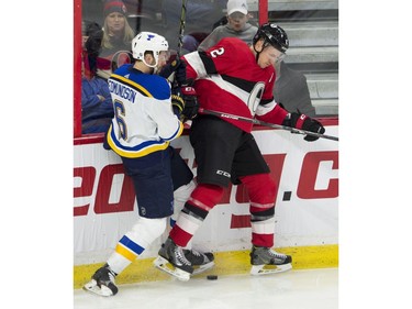 Ottawa Senators defenceman Dion Phaneuf (2) collides with St. Louis Blues defenceman Joel Edmundson.